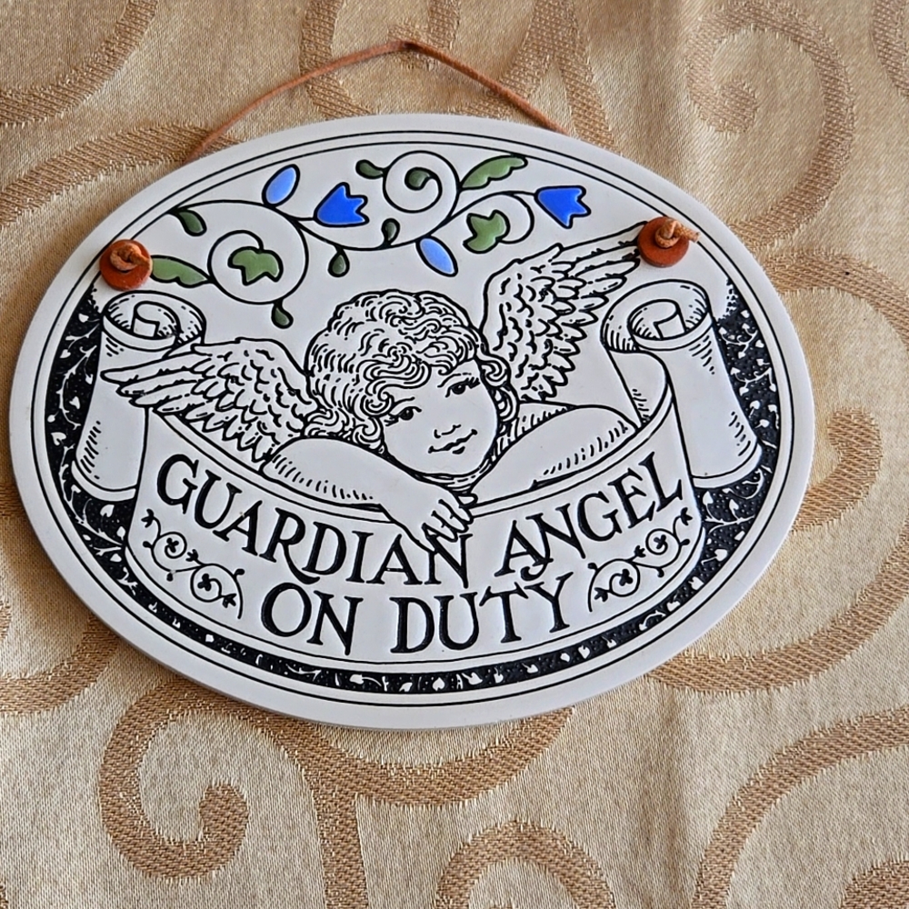 Stoneware guardian angel plaque